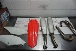 Honda CRF250R 18-21/RX Oem Stock Full Dual Exhaust Side Plastics Rear Fender. Fixed Price $250.00.