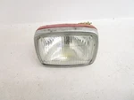 85 86 Honda Trx 125 Fourtrax Headlight Housing Lens 61301-VM6-000 Fits. Fixed Price $40.00.
