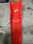 Honda 03-04 CRF250R Rear Fender Mud Guard Red. Fixed Price $15.00.