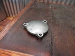 03-04 Kawasaki KLX400R Oil Filter Cover 11065-S002. Fixed Price $9.25.