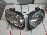 2007 03-09 Suzuki Burgman Oem Front Lamps Pair. Fixed Price $150.00.