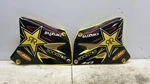 2001 Suzuki RM250 Radiator Shrouds Plastic Tank Cover 17762-37F10-YU1. Fixed Price $49.99.