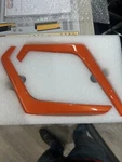 Pair Polaris Rzr Painted Orange Madness Fang Covers 5455695-589, 5455696-589. Fixed Price $64.99.